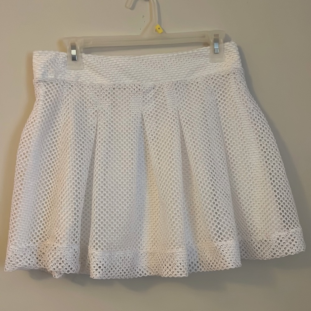 This is a white skirt from Banana Republic in size 8p.